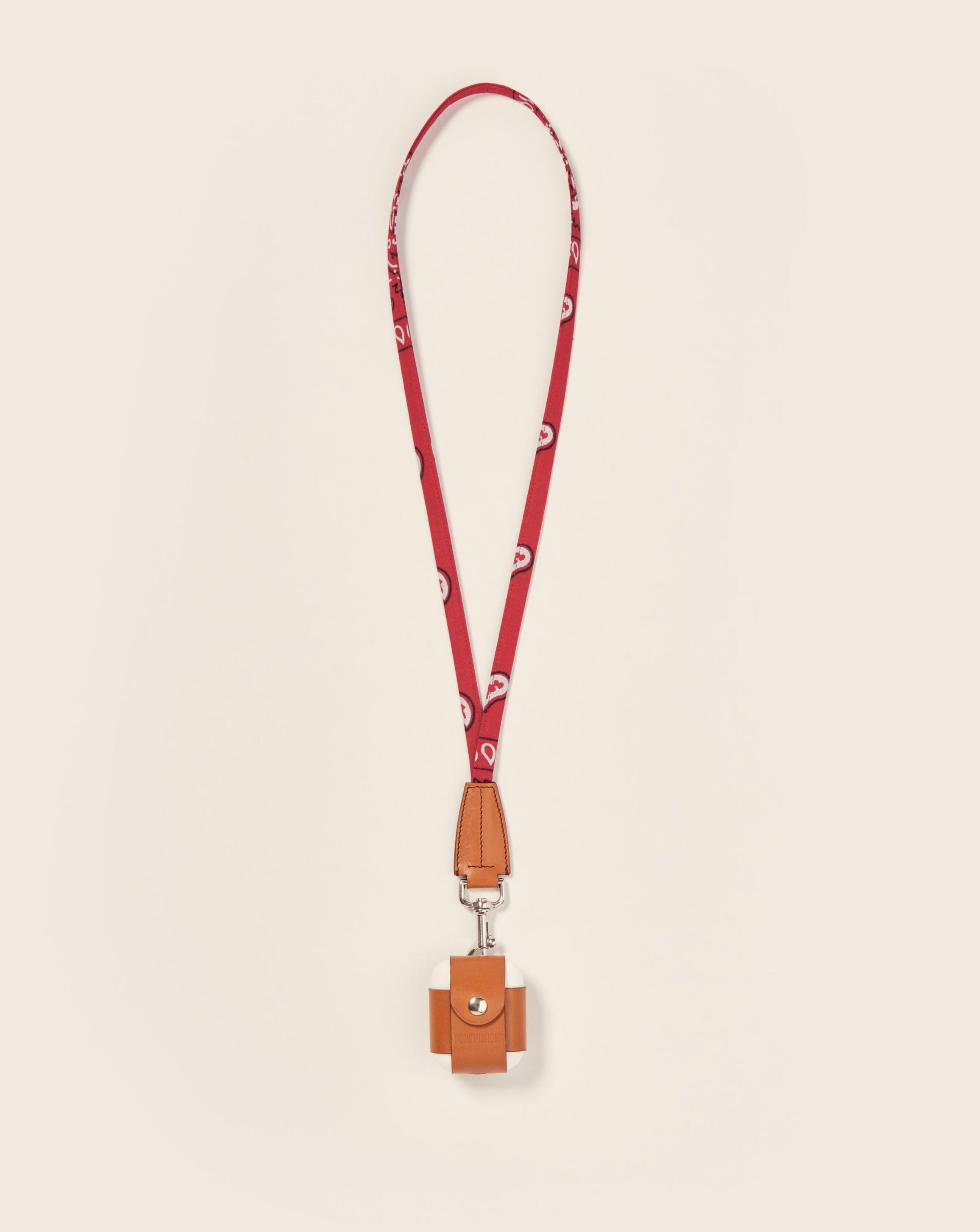 COOK + YARI-Étui AirPods sur mousqueton-En cuir gold & bandana rouge Ponctuations
