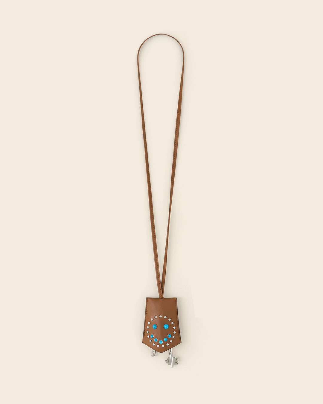 FUJI SMILE -Porte clés cloche en cuir-Cognac avec Clous et Cabochons Turquoises Porte-clés cloche Ponctuations
